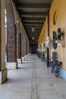 Szeged, Hungary. University of Dentistry named after Albert Szent-Gyorgyi next to Dom square and Votive Church