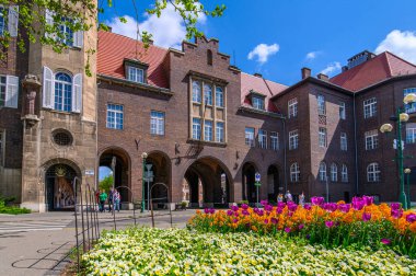 Szeged, Hungary. University of Dentistry named after Albert Szent-Gyorgyi next to Dom square and Votive Church