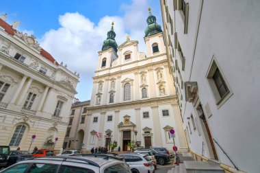 Vienna, Austria. Jesuit Church (Jesuitenkirche), also known as the University Church (Universittskirche) on Ignaz Seipel Platz in Wien clipart