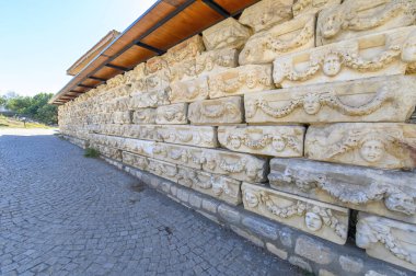 The ruins of Aphrodisias Ancient city (Afrodisias) in Turkey. The city was named after Aphrodite, the Greek goddess of love. Ancient Mask Relief clipart