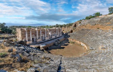 Nysa Ancient City in Sultanhisar district of Aydin Province of Turkey. Nysa on the Maeander in ancient Lydia, first was a greek city and later an roman city. View of the amphitheater clipart