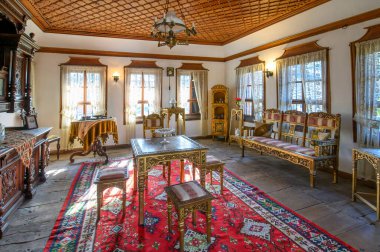 Tryavna, Bulgaria. Interior of The Raykov house. Traditional Bulgarian house interior of the 19th century clipart