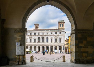 Bergamo, Italy. The old main square Piazza Vecchia and the public library Angelo Mai clipart