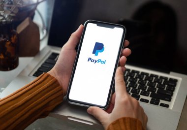 Thailand.NOV  10, 2022: PayPal the largest operator of electronic money it was founded in 1998. PayPal most popular way of reception and sending Internet of payments