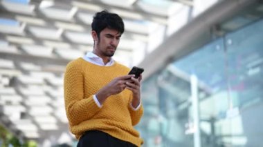 Man  using smart phone, omni channel, outside