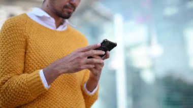 Man  using smart phone, omni channel, outside