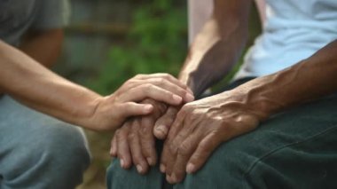 Hands of the old man and  woman 