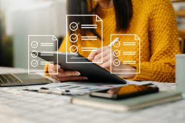businesswoman with laptop and tablet pc at home office. 