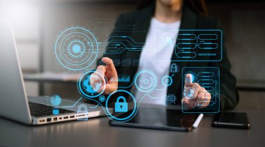 Cyber security and data protection information privacy internet technology concept.Businesswoman working on computer show padlock protecting business and financial data technology concept. in office