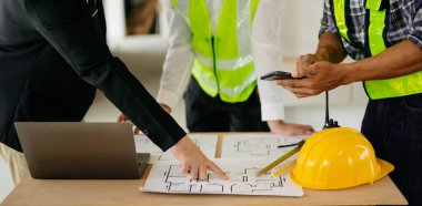 Engineer Teamwork Meeting, workers with blueprint on meeting