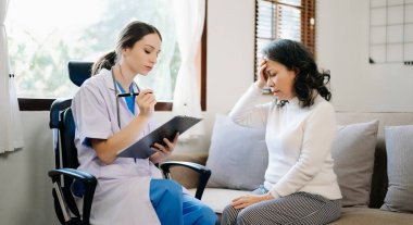 Psychology, depression. Suffering asian old woman, consulting with  doctor while patient counseling mental problem. Encouraging, therapy, health care
