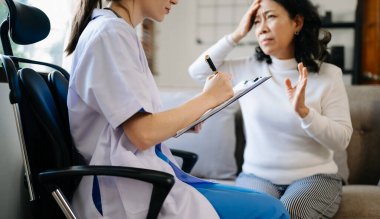 Female doctor and senior patient , elderly concept 