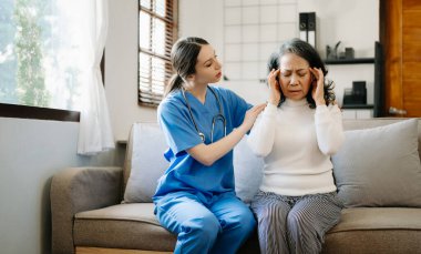 Psychology, depression. Suffering asian old woman, consulting with  doctor while patient counseling mental problem. Encouraging, therapy, health care