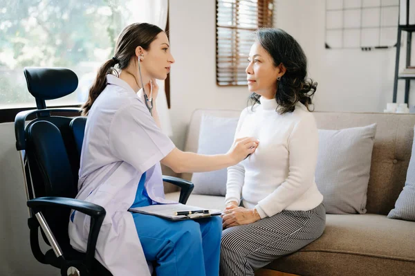 Psychology, depression. Suffering asian old woman, consulting with  doctor while patient counseling mental problem. Encouraging, therapy, health care