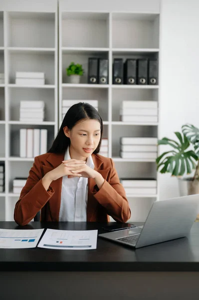 stock image Business woman using laptop in modern office