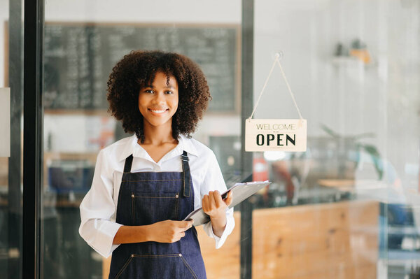 Startup successful small business owner  woman stand   in cafe 