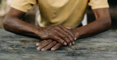 Close up of male wrinkled hands
