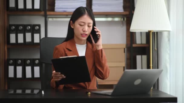 Businesswoman Using Laptop Phone Doing Math Finance Office Desk Tax — Stock Video