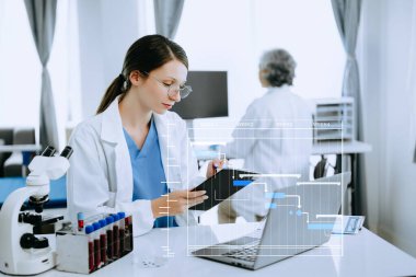 Project manager working and update tasks with Gantt chart scheduling diagram at hospital .success smart medical doctor working with smart medical doctor as concept