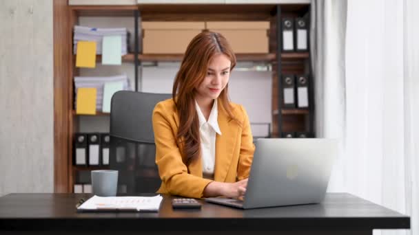 Successful Asian Businesswoman Analyzing Finance Laptop Office Desk Tax Report — Stock Video