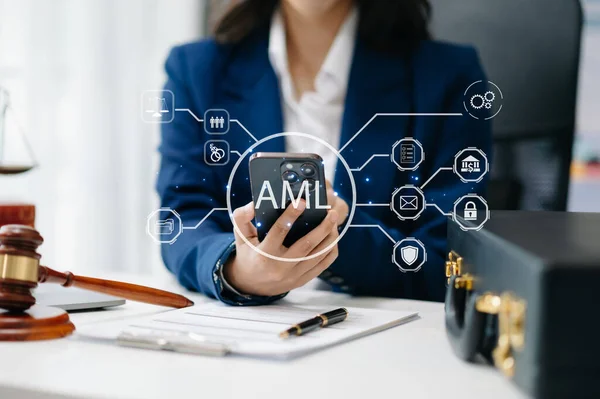 AML Anti Money Laundering Financial Bank Business Concept. judge in a courtroom using smartphone. AML anti money laundering icon