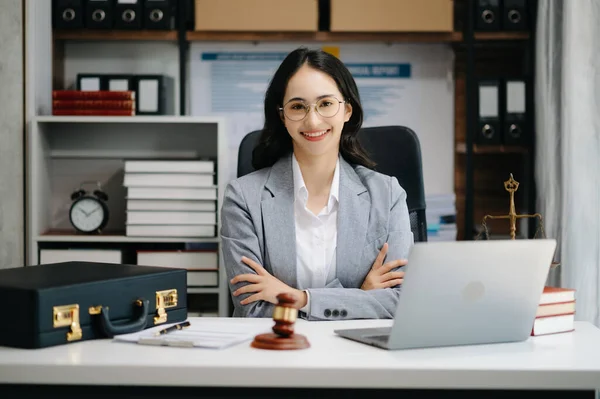 Beautiful asian woman lawyer working  in the office. Advice justice and law concept