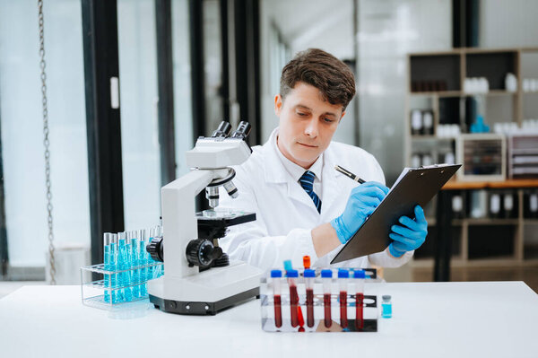 Modern medical research laboratory. scientist working with micro pipettes, analyzing biochemical samples, advanced science chemical laboratory for medicine.