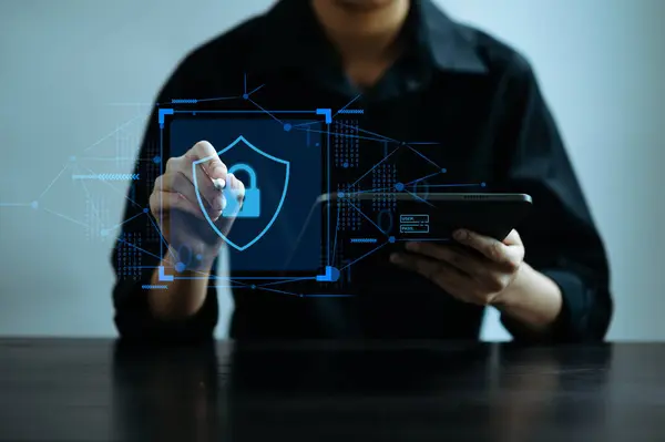 Cybersecurity and privacy concepts to protect data. Lock icon and network security technology. Man protecting personal data with technologies and virtual screen interfaces