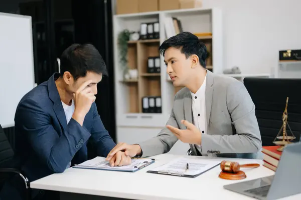 stock image Judge concept. Lawyer consulting and discussing contract papers with client at law firm in office