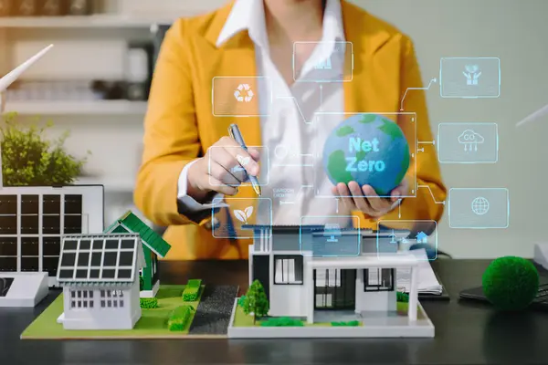 stock image Businesswoman  hands presenting green energy project for real estate 