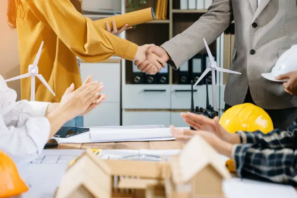 stock image Engineer team hardworking to consults about building project, business people shaking hands 