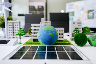 Ağ sıfır ve karbon nötr konsept. NET ZERO simgeleri ve sembolleri masadaki eko dünyasını, dünyayı, güneş panellerini ve yel değirmenlerini kurtarır 