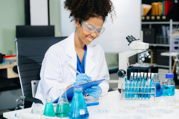 Modern medical research laboratory. female scientist working with micro pipettes analyzing biochemical samples, advanced science chemical laboratory for medicine. 