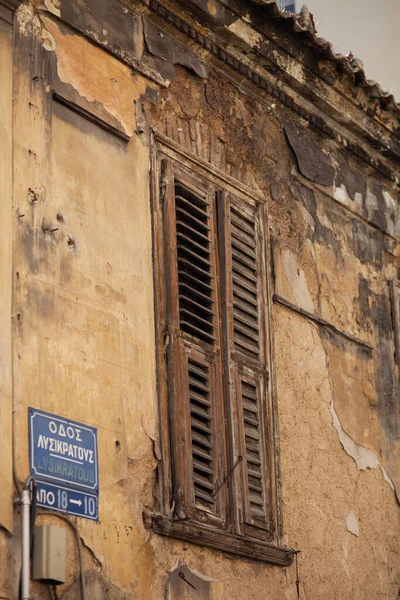 Stock image old window in the city of the ancient town of the village