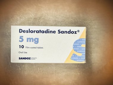 Hatyai Songkhla Tayland. 26 Nisan 2025 tarihinde film kaplamalı tablet başına Desloratidine Sandoz 5 mg. Yatıştırıcı içermeyen antihistaminikler.