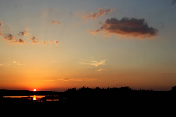 Beautiful Sunset on the Danube River in Vojvodina, Serbia. Sky with Clouds.