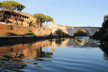 Rome, Italy - September 13 2022: Beautiful Tiberina Island Rome, Italy with Tiberis River and Cestio Bridge clipart