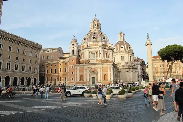 stock image Rome, Italy - September 14 2022: Rome Panorama with Traffic, Santa Maria di Loreto Church, Trajan's Column and  Church of the Most Holy Name of Mary at the Trajan Forum at Piazza Venezia, Italy