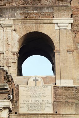 Colosseum with Christian Cross Detail in Rome, Italy clipart