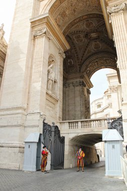 Rome, Italy - September 15 2022: Papal Swiss Guards and the Beautiful Saint Peter's Basilica, Vatican, Rome, Italy clipart