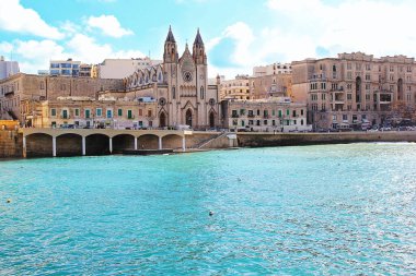 Malta Isoland View with St. Julian Bay with Carmelite Church clipart