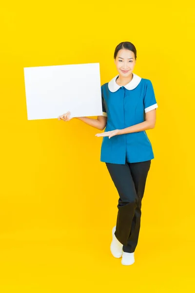 Portrait Beautiful Young Asian Woman Maid Housekeeping Smile Action Yellow Stock Photo