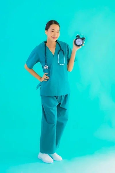 Portriat Beautiful Young Asian Doctor Woman Show Clock Alarm Blue — Stock Photo, Image