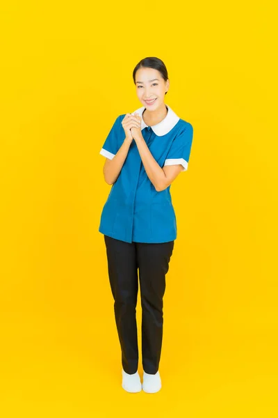Portrait Beautiful Young Asian Woman Maid Housekeeping Smile Action Yellow — Stock Photo, Image