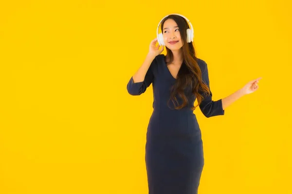 Portrait Beautiful Young Asian Woman Headphone Listen Music Yellow Isolated — Stock Photo, Image