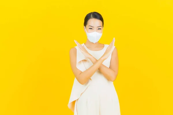 Portrait Beautiful Young Asian Woman Mask Protect Covid19 Virus Yellow — Stock Photo, Image