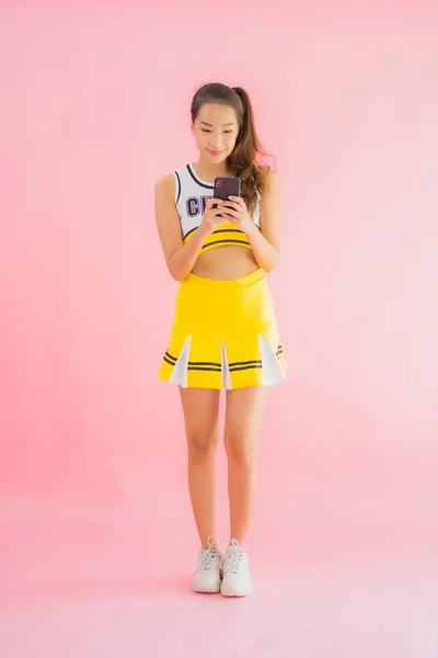 Portrait Beautiful Young Asian Woman Cheerleader Smart Mobile Phone Pink — Stock Photo, Image