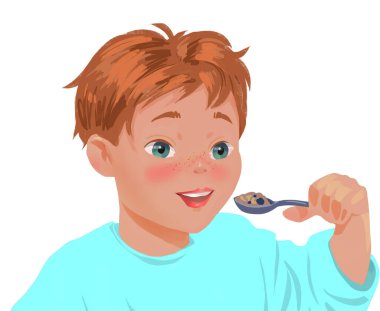 Küçük çocuk kaşık tutuyor ve yiyor.