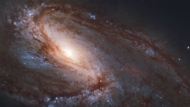 Panoramik sarmal gökada, NGC 3627. Parlak turuncu, kırmızı mavi, kara delik galaktik uzun menzilli görüntüler. Bu görüntünün elementleri NASA tarafından desteklenmektedir (Hubble teleskobu tarafından gözlemlenmiştir.)