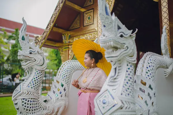 stock image South Asian model in Thai costume Chiang Mai Thailand Buddhist temple